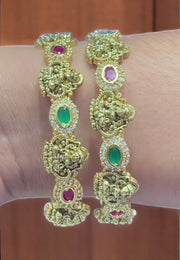 Beautiful bangles with God laxmi motive and ruby, green stone -embrace the beauty in you
